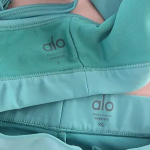 ALO Yoga Airlift Intrigue Bra & High-Waist 4 Pocket Utility Legging Set thumbnail 8