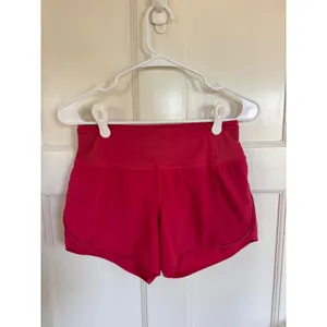 Lululemon bright pink running shorts Size 4 thumbnail 2