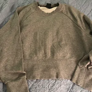 Nike Gray Cropped Sweatshirt. Embossed Nike On Front Womens Medium thumbnail 1