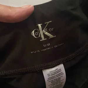 CK Calvin Klein zipper ankle black leggings, size medium thumbnail 3