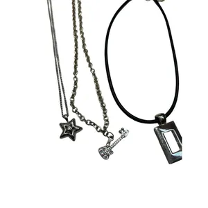 Three silver toned necklace set - guitar pendant, dog paw and square pendant s thumbnail 3