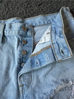Levi’s 501 denim light wash shorts with distressing, size 29 thumbnail 2