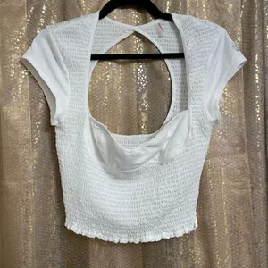 Free People White Strike A Pose Smocked Cropped Top Large NWOT thumbnail 1