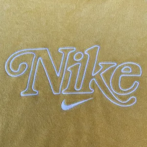 Nike Yellow Embroidered Center Swoosh Terry Cropped Long Sleeve T-shirt thumbnail 4