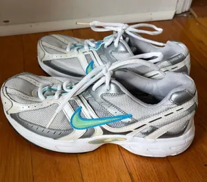 Nike Women's White and Gray Sneakers with Blue Swoosh thumbnail 1