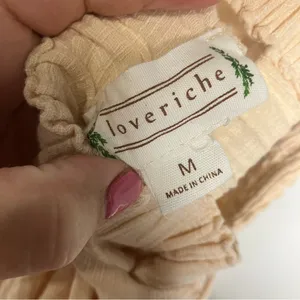 Loveriche cream raw hem jumpsuit‎ open back tie waist women's size medium trendy thumbnail 8