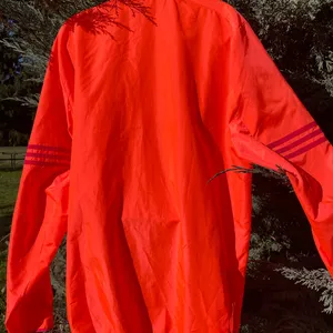 Adidas Women's Bright orange Windbreaker thumbnail 4