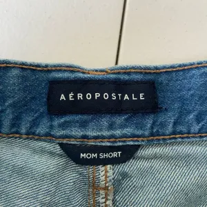 EUC | Aeropostale women’s light wash ripped denim mom shorts‎ — size 0 thumbnail 5