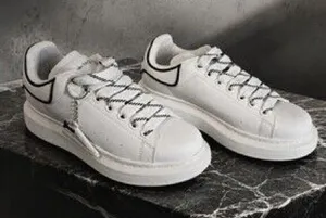 Alexander McQueen White Leather Sneakers with Black Trim thumbnail 1