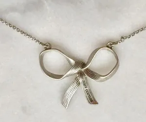Juicy Couture Etched Silver Bow Necklace thumbnail 1