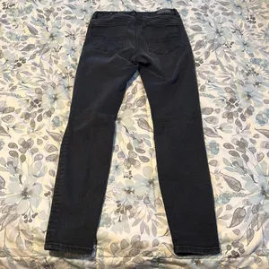 America Eagle Next Level Stretch Black Distressed Jeans Size 2 thumbnail 7