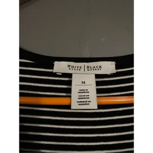 White House Black Market Black And White Curve Hem Long Sleeve Dress Size M thumbnail 4