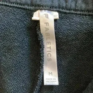 ⭐️ Fabletics black high rise sweatpants in size medium thumbnail 6
