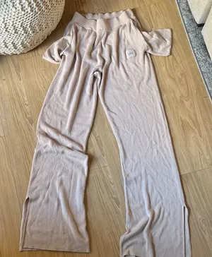ALO Yoga Ribbed Lounge Pants in Soft Beige thumbnail 1