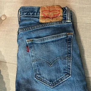 Levis Classic Blue Denim Distressed Jeans Size 28 thumbnail 8