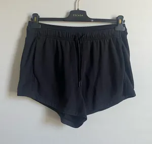 Lululemon black 3” inseam workout athletic shorts size 4 thumbnail 1