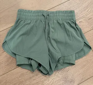 Amazon Sage green running shorts with spandex underneath thumbnail 1