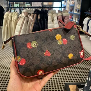 NWT Coach Nolita 19 In Signature Canvas wristlet With Ornament Print‎ thumbnail 4