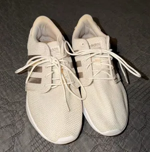 adidas Women’s Cream Knit Sneakers with metallic Stripes thumbnail 1