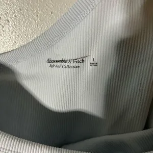 Abercrombie & Fitch Light Blue Bodysuit Asymmetrical Design Size L thumbnail 4