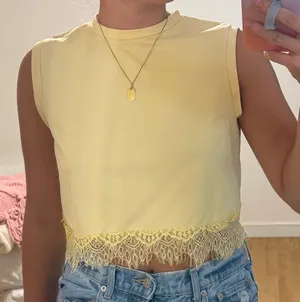 Yellow SHEIN crop top with lace trim thumbnail 1