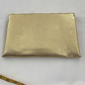 Shimmering Vintage faux leather gold clutch. thumbnail 2