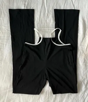 Black and white SHEIN flare pants with white trim #y2kfashion #flares Size 4 Worn once Very soft quality but don't need them anymore thumbnail 1