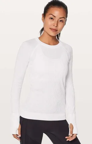 Lululemon Rest Less Pullover in white with a textured design XS thumbnail 1