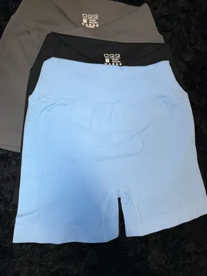 OQQ Women's Seamless High Waisted Ribbed Crossover Yoga Biker Shorts thumbnail 1