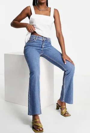 ASOS DESIGN high rise '70's' stretch flare jeans in midwash thumbnail 2
