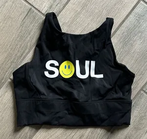 SoulCycle Black Sports Bra with Yellow Detail thumbnail 1