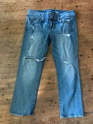 American Eagle Artist low rise medium wash distressed jeans thumbnail 1