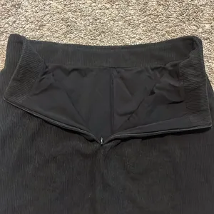 Halara High Waisted Invisible Zipper 2-in-1 A Line Mini Corduroy Black Skirt Med thumbnail 8