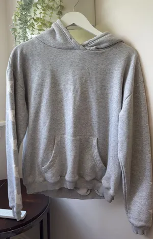 Gray Starfit hoodie with white star pattern on sleeves size medium thumbnail 1