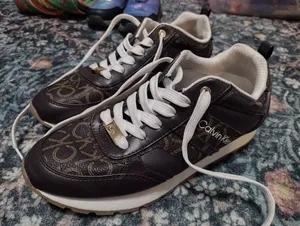 Calvin Klein Brown Monogram Lace-Up Sneakers thumbnail 1