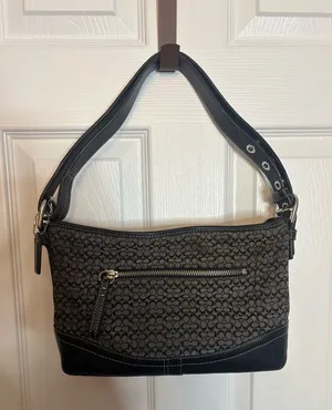 Vintage Coach Mini Soho hobo bag in a black and grey signature C monogram thumbnail 1