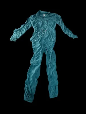 Fabletics x Madelaine Petsch McKenzie Woven Ruched Jumpsuit - Teal xs thumbnail 1
