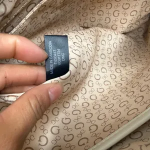 GUESS Quilted Two-Tone Tote in White and Black with Gold Hardware thumbnail 11