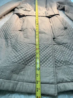 XS beige Kenneth Cole quilted trench coat features a belted waist and a diagonal zip closure. thumbnail 4