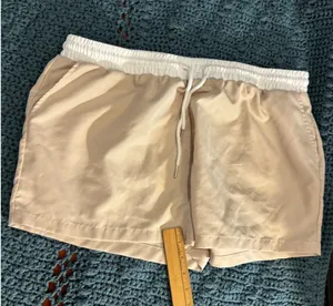 Tan Athletic Shorts with White Elastic Drawstring Waistband and Pockets thumbnail 1