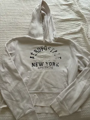 Aeropostale white hoodie size small so cute and comfy just trying to declutter There are 2 small holes on each arm as pictured thumbnail 1
