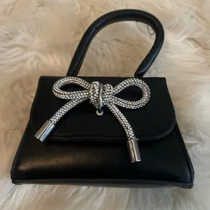 Elegant Black Handbag with Silver Accents thumbnail 5