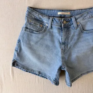 Levi's A-Line High Rise Denim Shorts Women 28 Light Wash Blue thumbnail 5