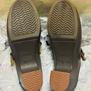 Crocs Sarah clogs in a brown color with a tan suede leather strap thumbnail 4