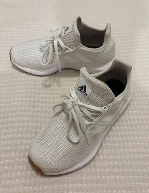 White adidas tennis shoes thumbnail 1