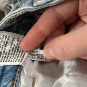American Eagle light wash distressed High-rise Jean Shorties denim shorts size 0 thumbnail 11
