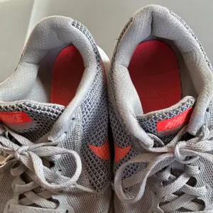 Nike revolution 3 Sneakers in Gray with Bright Orange Accents women’s size 7.5 thumbnail 6