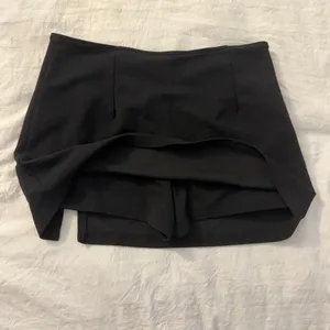 Black mini skirt with built in shorts thumbnail 2