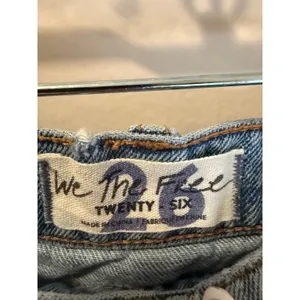 We The Free Free People Distressed Denim Mini Skirt Crossover Waist 26 thumbnail 2