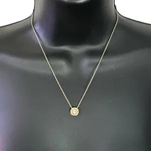 Coach gold tone crystal logo pendant necklace thumbnail 1